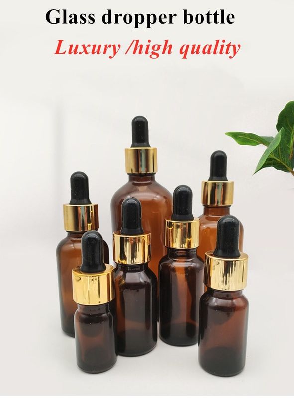 Venta caliente 5ml 10ml 15ml 30ml 50ml Ámbar suero de aceite esencial Botellas de vidrio botella de goteo