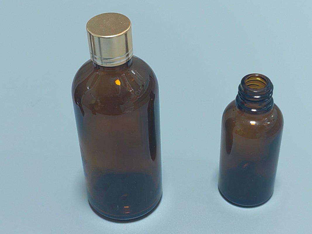 Envase de aceite esencial 1OZ 2OZ 20ml 30ml 50ml suero de aceite esencial de ámbar Botella de goteo de vidrio con tapa a prueba de niños