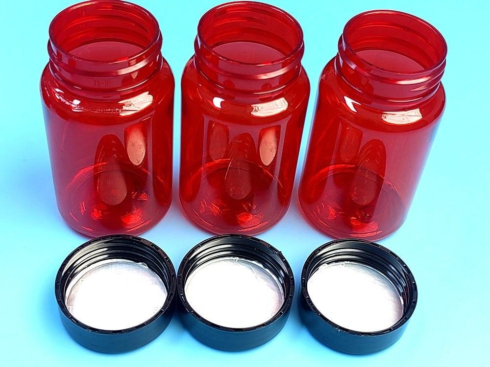 Medicamento para el cuidado de la salud Botella de píldoras 100 ml PET Capsula de plástico rojo Embalaje Vitamina Botella de píldoras Botella con tapa de tornillo