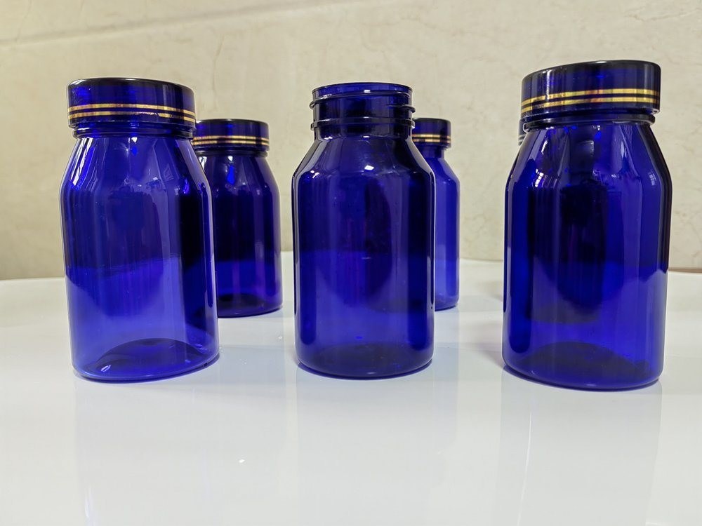 Botella de plástico de 100cc 120cc 150cc para píldoras cápsulas transparente azul para mascotas botella de plástico recargable de dosis sólida