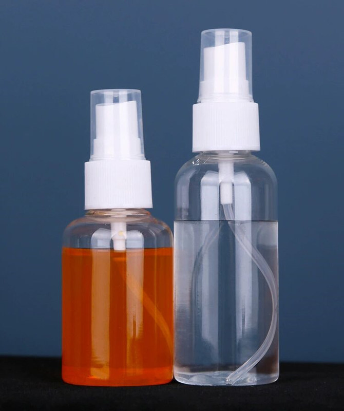 Botella de pulverización de plástico PET de forma redonda de 60 ml 100 ml botella de pulverización de plástico PET de 50 ml cosmética PET transparente para lavado de manos Desinfectante