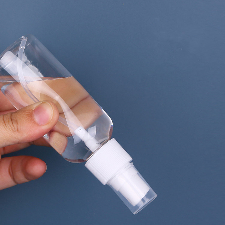 Botella de pulverización de plástico PET de forma redonda de 60 ml 100 ml botella de pulverización de plástico PET de 50 ml cosmética PET transparente para lavado de manos Desinfectante