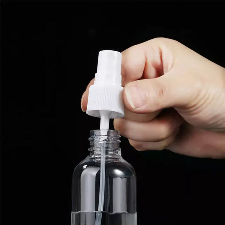 Botella de pulverización de plástico PET redonda y plana de 50 ml de bolsillo portátil para viajes
